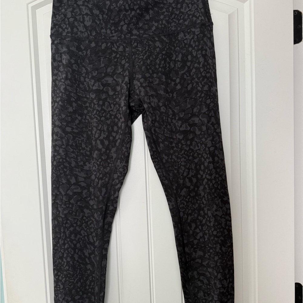 Lululemon Wunder Under Leggings in black leopard print.